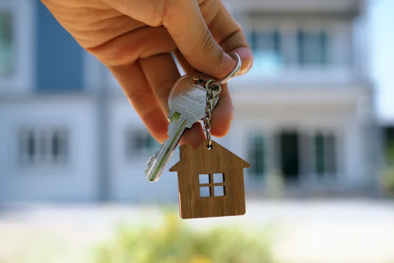 Person holding a key.