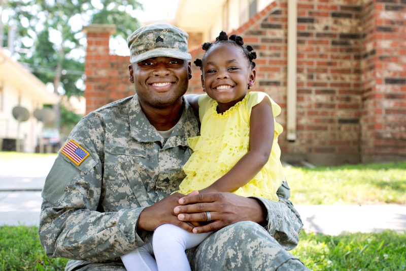 Americann Soldier and his daugther.